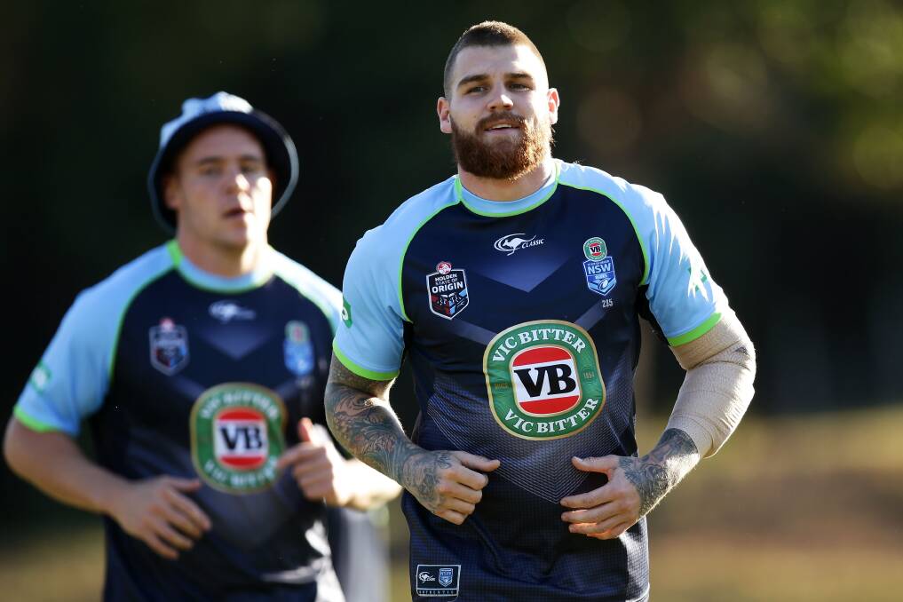 Out: Josh Dugan with a heavily strapped left arm during NSW Origin camp. He has been ruled out with an elbow injury.
