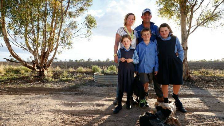 Bek and Jed Cullen with the children, Pippa, 6, Jock, 8 and Molly, 10, on the property near Walgett.  Photo: Peter Rae