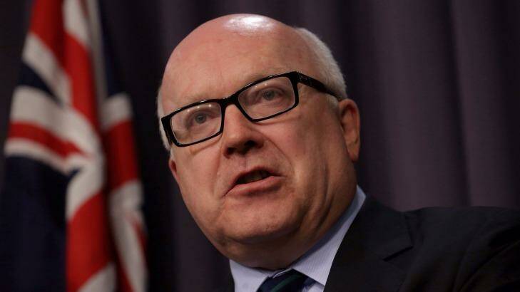 Attorney-General George Brandis has included language into the new anti-terrorism bill to explicitly ban the use of torture against terror suspects. Photo: Andrew Meares