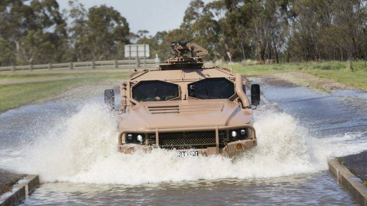 The army's new Hawke off-roader is put through its paces. But does it come in black? Photo: Simon O'Dwyer