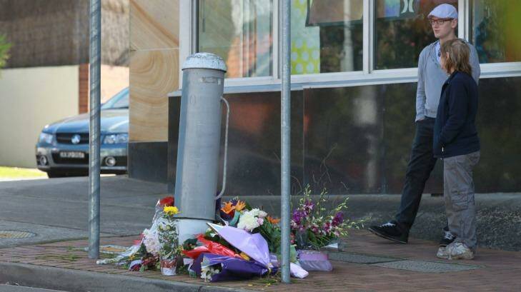 Flowers for Mijin Shin, who died after being hit by a bus at an intersection in Beecroft. Photo: Simon Alekna