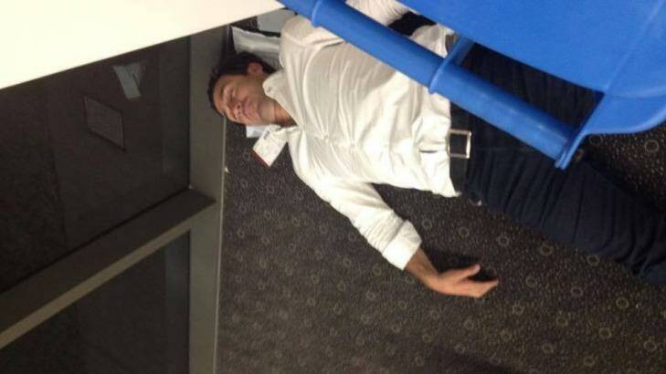 Photo of Andrew Johns apparently asleep in Toowoomba Airport posted onto Facebook today . Photo by: Facebook / Helen Wright
3rd October 2015
