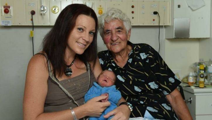 Mum Rikki Bennett, son Logan Peter and great-grandmother Dot Looker at Wodonga hospital on Monday following his dramatic entry to the world. Photo: Daniella Miletic