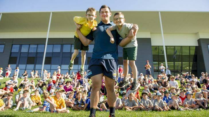 The Tuggeranong Vikings' Tyrel Lomax was a hit with the kids at a Brumbies fan day late last year. Photo: Jay Cronan
