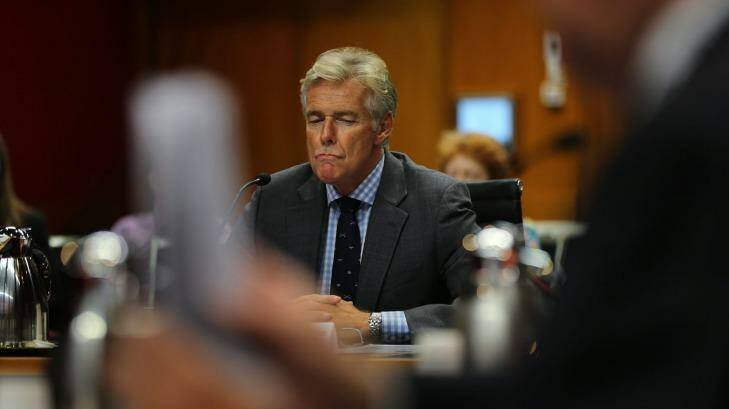 Former MP Tim Owen answers questions at the NSW Parliament inquiry into Newcastle corruption. Photo: Kate Geraghty