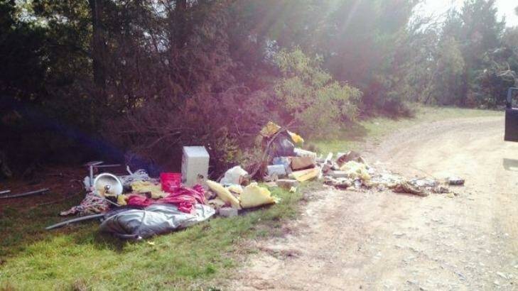 Spent firearm cartridges were found in this rubbish dumped at Lark Hill Winery. Photo: Supplied