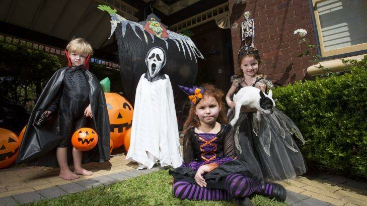 In the spirit: Josh Waite, 3, Lachlan Waite, 5, Alex Gemenis, 6, and Helena Gemenis, 4, prepare for Halloween. Photo: Anna Kucera
