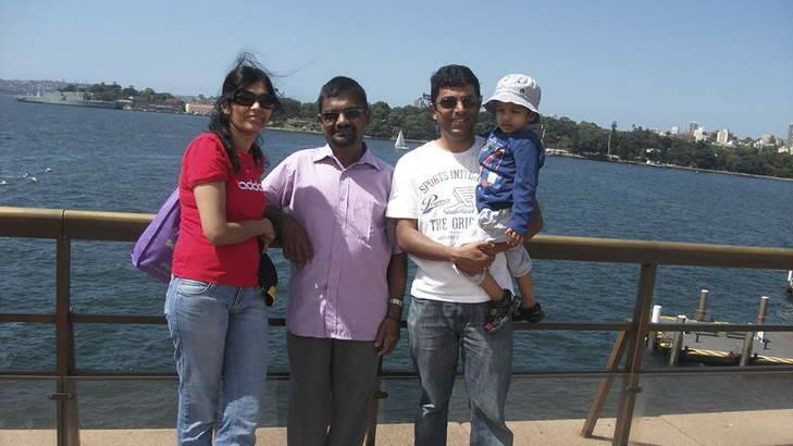 Fatal accident: Priya Muthu with her husband (far right) holding their son. Photo: Supplied