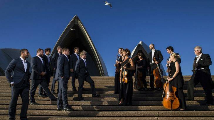 Players from the NSW Waratahs and members of the Sydney Symphony Orchestor on the steps of the Sydney Opera House.   Photo: Nic Walker
