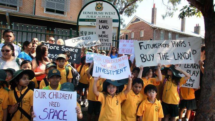 Parents and children protest at Homebush West Public school where children have been banned from running due to overcrowding.  Photo: Ben Rushton