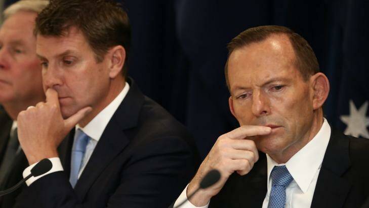 NSW premier Mike Baird with the then prime minister Tony Abbott. Photo: Alex Ellinghausen