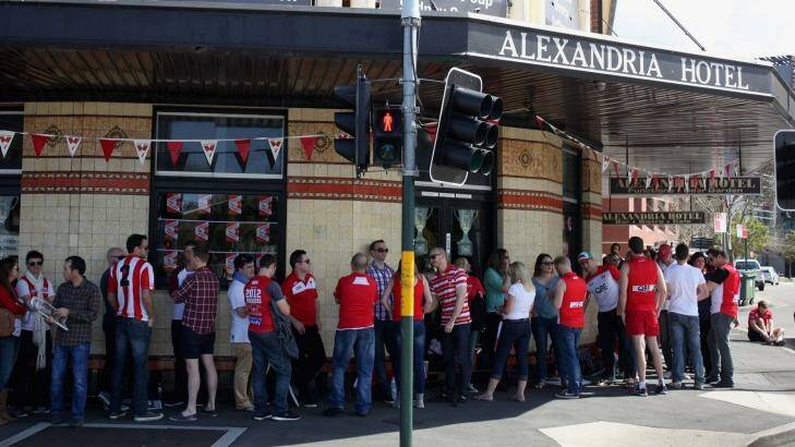 Swans fans soak up the atmosphere at the Alexandria Hotel in Sydney.  Photo: Fiona Morris