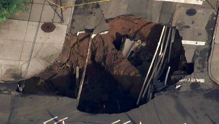 The sinkhole in a Brooklyn, New York, street. Photo: Twitter