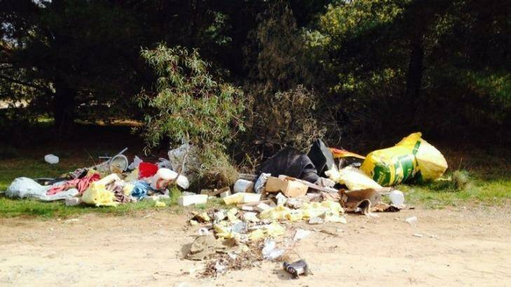 Spent firearm cartridges were found in this rubbish dumped at Lark Hill Winery. Photo: Supplied