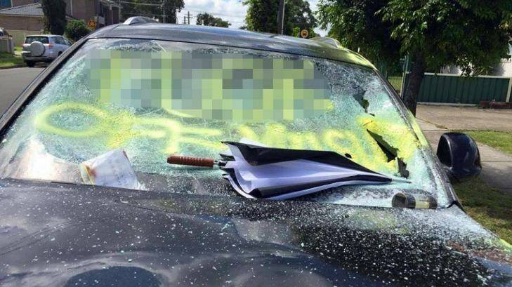 As well as graffiti, the windscreen was smashed in. Photo: Islamophobia Register Australia's Facebook page