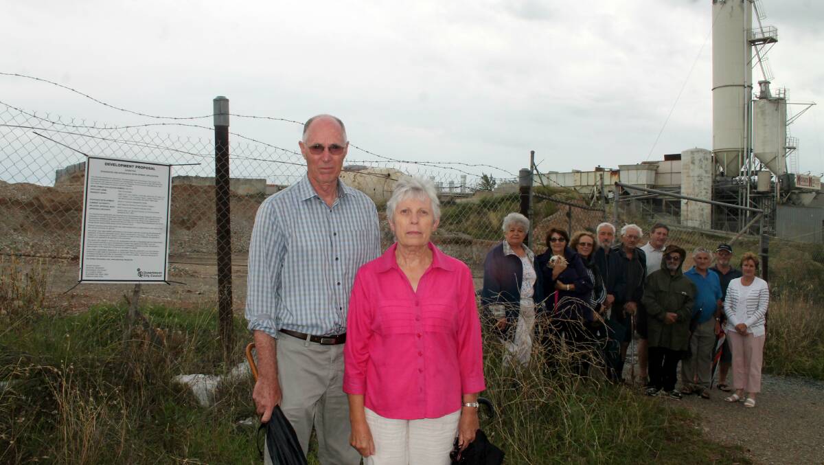Peter and Wendy Ellis with a group of concerned residents who live near the proposed recycling facility in West Queanbeyan.