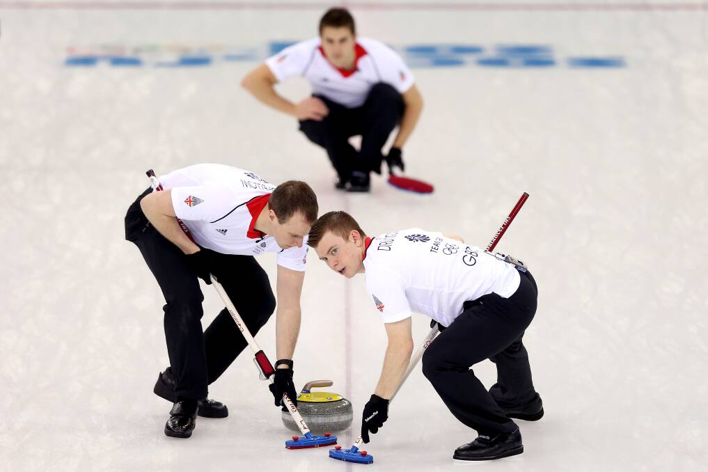 Michael Goodfellow and Greg Drummond of Great Britain sweep the ice while playing Norway during the Curling at Ice Cube Curling Center on day 11 of the 2014 Sochi Winter Olympics on February 18, 2014 in Sochi, Russia. Photo: GETTY IMAGES