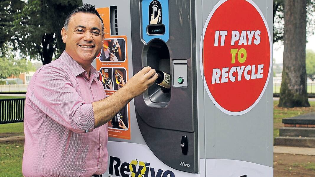 John Barilaro MP testing out a standalone reverse-vending-machine in Queanbeyan last year. Photo: Supplied. 
