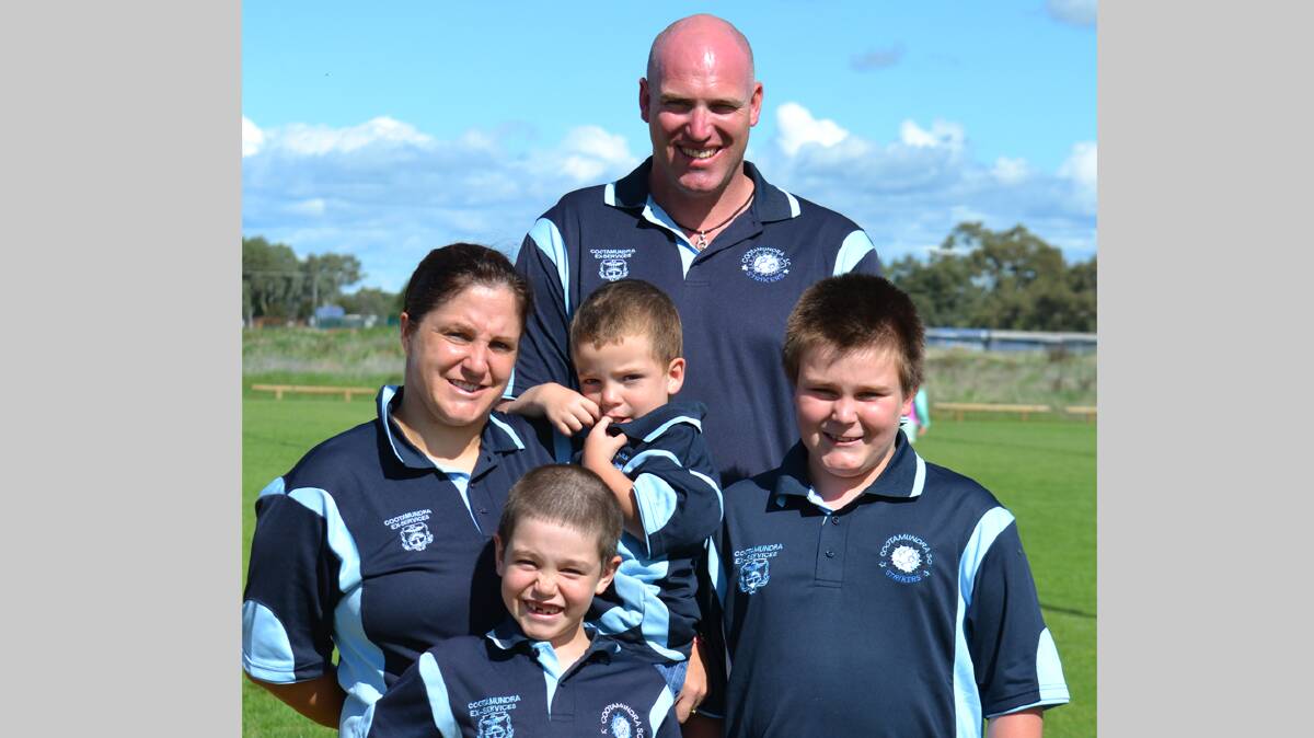 COOTAMUNDRA: Mick Simons had wife Alana and children (from left) Mitchell, Harry and Andrew on hand last weekend to show support for his 300th game playing for the Cootamundra Strikers. Most of these games have been played in first grade.  Photo: Kaylene Ashley