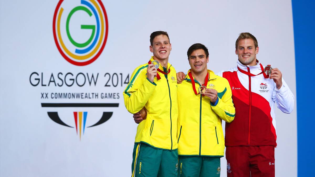 GLASGOW, SCOTLAND - JULY 27: Gold medallist Ben Treffers of Australia poses with silver medallist Mitch Larkin of Australia and bronze medallist Liam Tancock of England during the medal ceremony for the Men's 50m Backstroke. PICTURE: GETTY