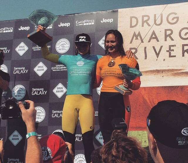 2015 Drug Aware Margaret River Pro champion Courtney Conlogue on stage with the runner-up Clarissa Moore. Photo: seayousoon_de/Instagram. 