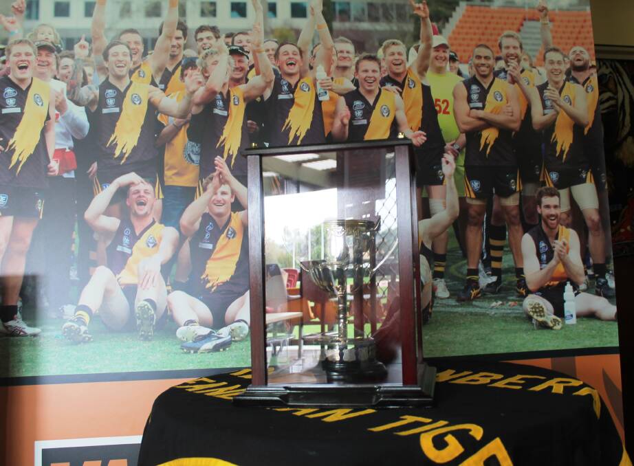 The Queanbeyan Tigers 2012 NEAFL Eastern Conference title trophy lies in a proud football office at Dairy Farmers Oval. Photo: Joshua Matic.