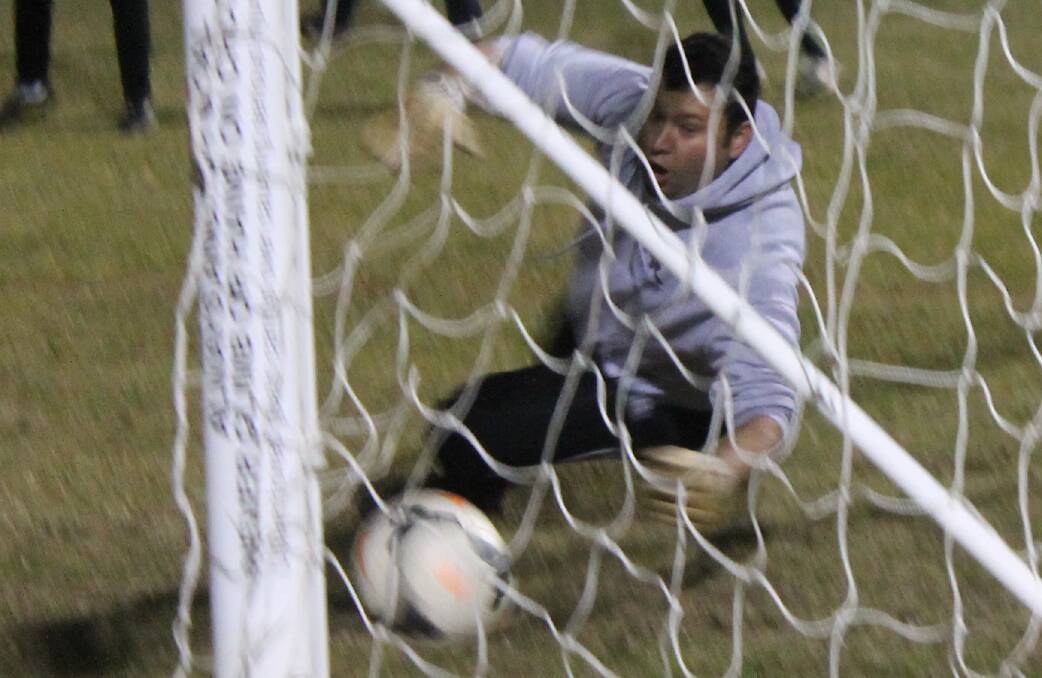Monaro Panthers goal-keeper Igor Ilievski saves a goal at team training in preparation of the side's semi-final against ANU. Photo: Joshua Matic.