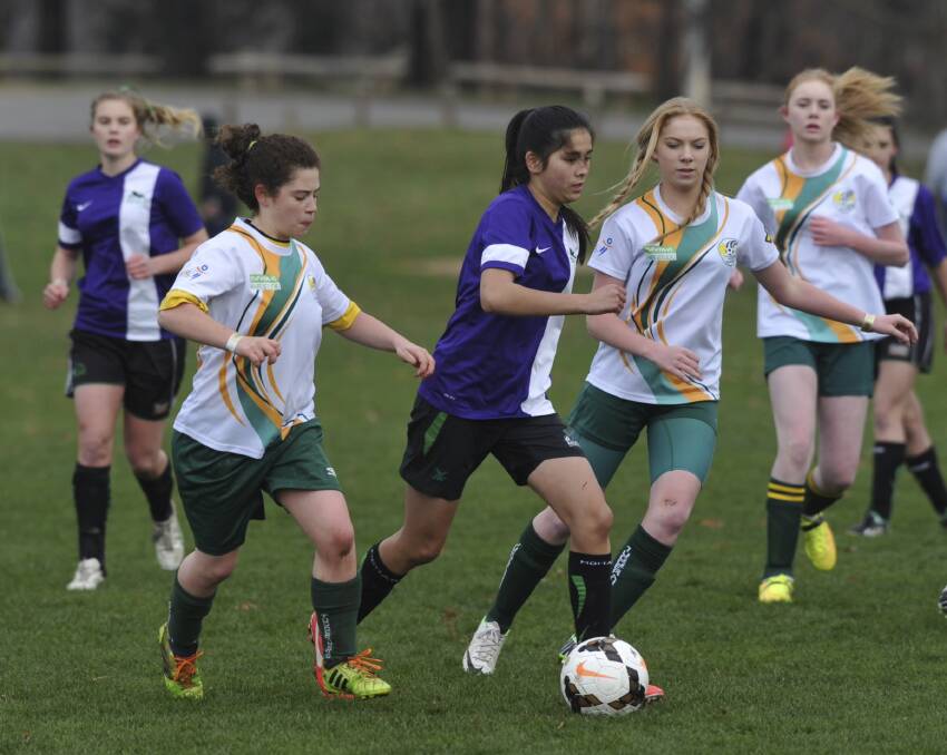 Monaro Panthers under 16s/17s player Sophie Bui moves the balll through Tuggeranong's defence in their Kanga Cup semi-final last week. Photo: Rohan Thomson.