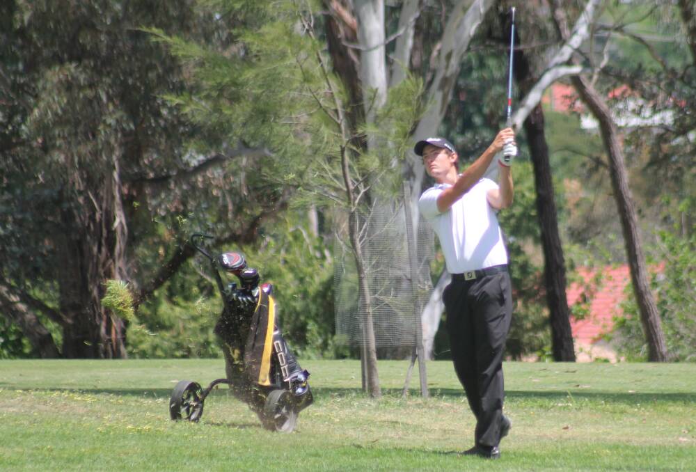 Queanbeyan golfer Lachlan Tisma shoots on the first hole of round four of the Queanbeyan Golf Club men's championships last Sunday. Photo: Joshua Matic.