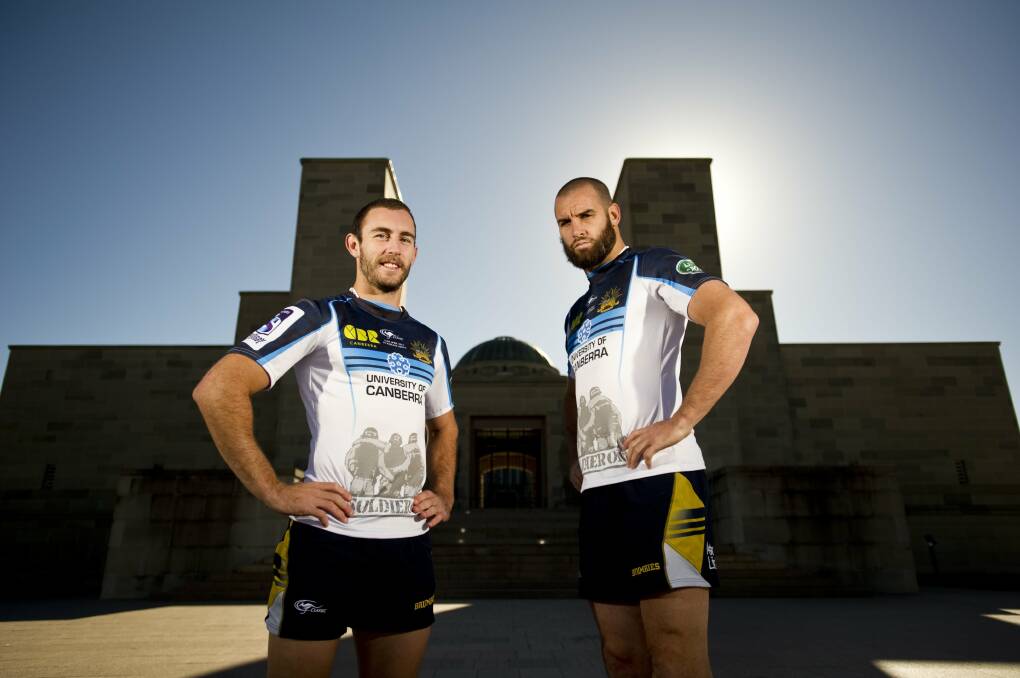 Queanbeyan Whites player Nic White with ACT Brumbies team mate Scott Fardy at the Australian War Memorial last week. Three Whites players will play in Super Rugby's first ANZAC Day clash at Canberra Stadium. Photo: Joshua Matic.