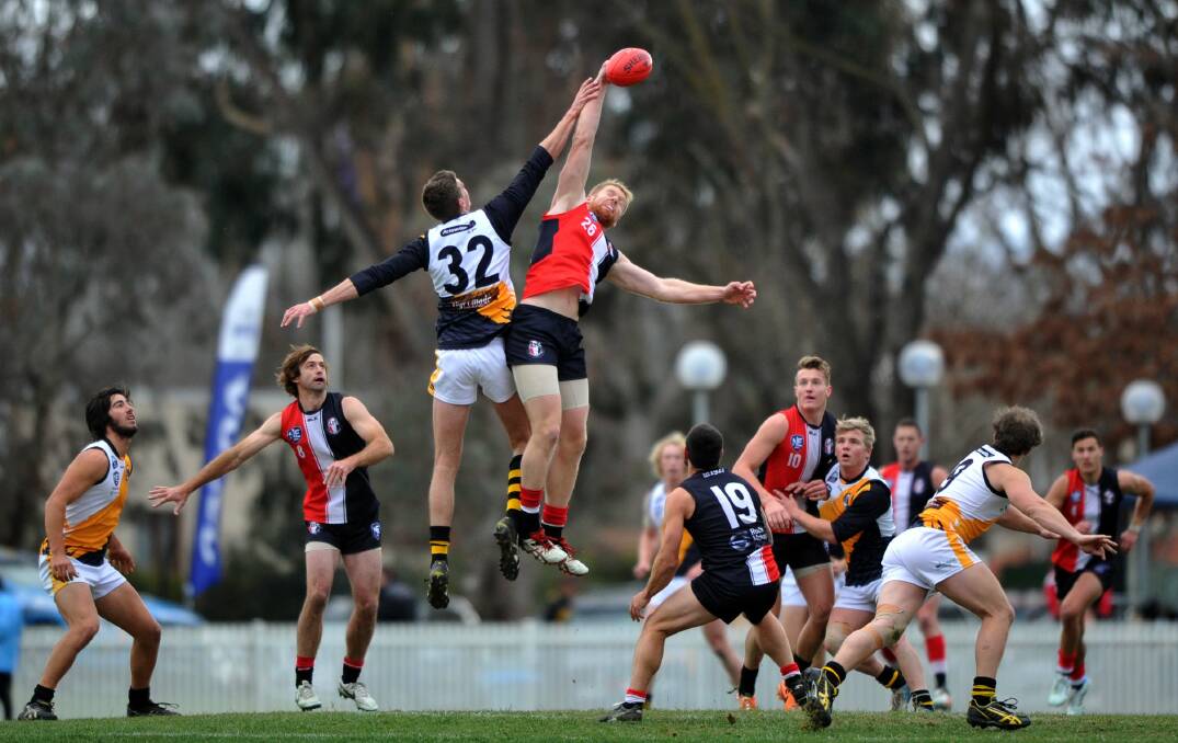 The Queanbeyan Tigers in action in their last NEAFL match against Ainslie a fortnight ago. Photo: The Canberra Times.