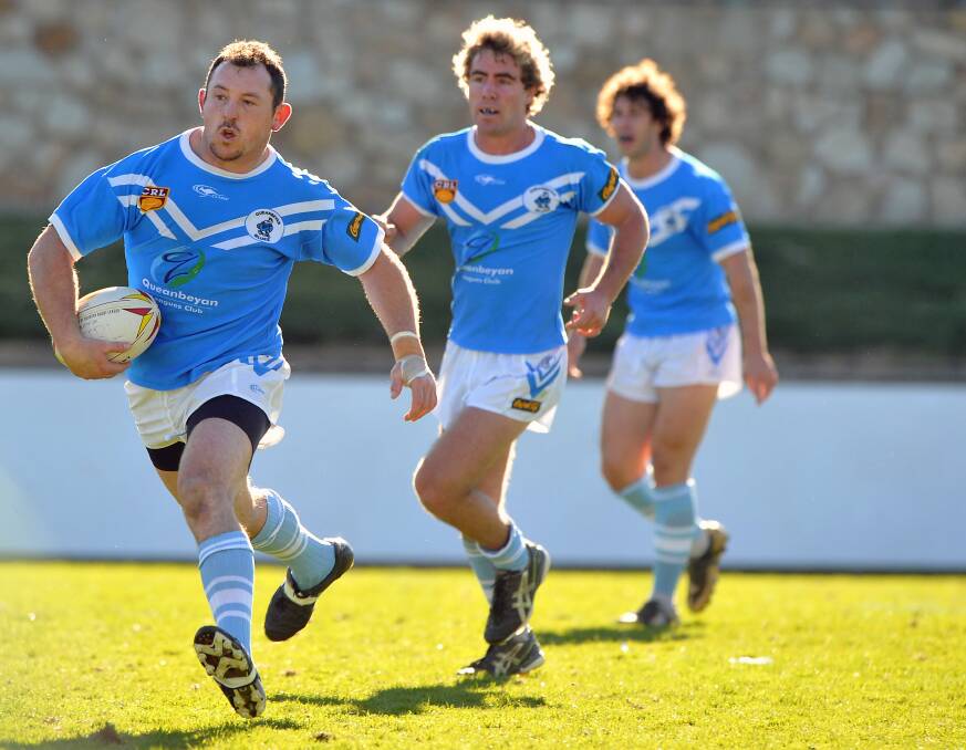 Queanbeyan Blues' retiree Phil Stonham (left) playing back in 2009.