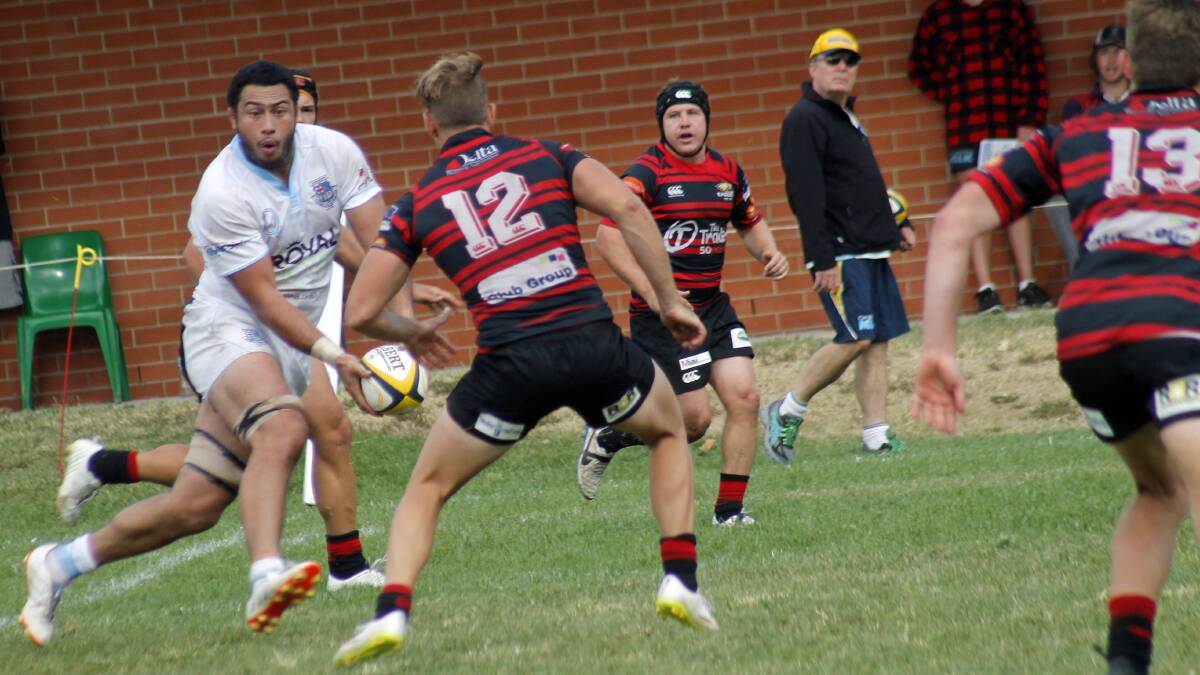 Queanbeyan's OJ Noa takes on the Gungahlin defence during his standout performance in the Whites victory. Photo: Steph Konatar.