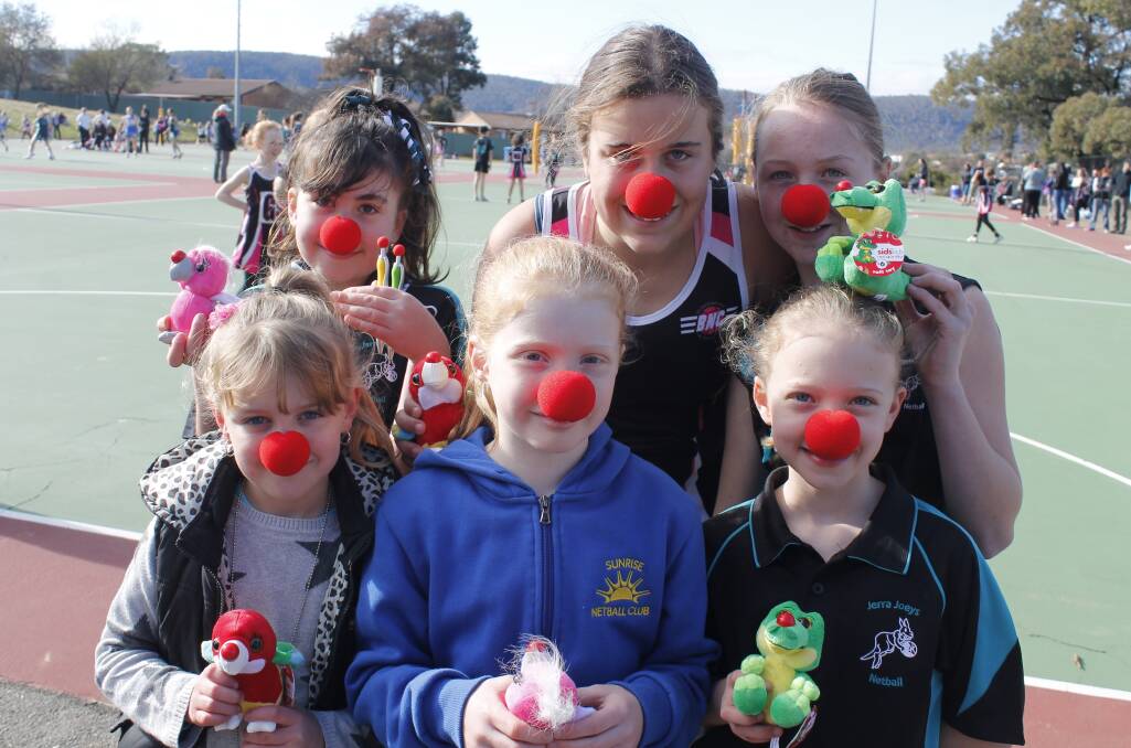 Queanbeyan Netballers supporting Red Nose Day- Back: Justine Rasheed, Deanna Fowler and Aleisha Read. Front: Marhlee Herekiuha, Josaphine Sanders and Maeve Stevens. Photo: Steph Konatar.