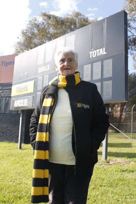 Jill Bright has dedicated about 60 years of service to the Queanbeyan Tigers Australian Football Club. Photo: Steph Konatar.