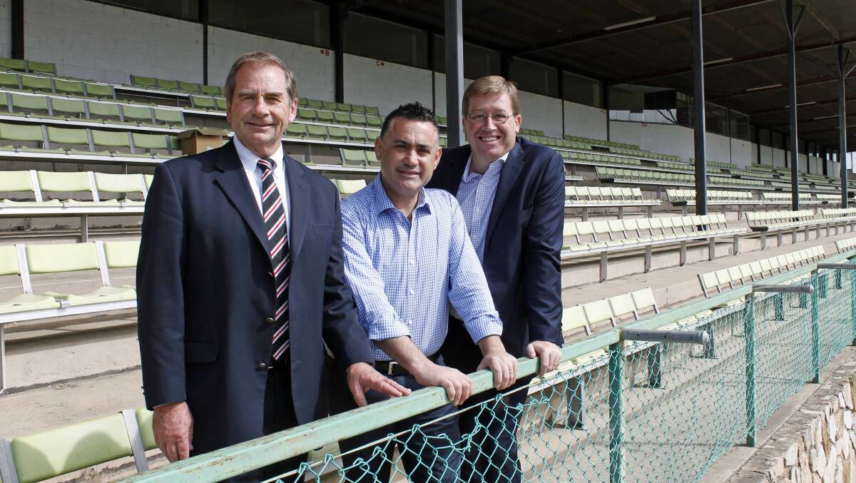Queanbeyan mayor Tim Overall, local member John Barilaro and NSW deputy premier Troy Grant announce a major upgrade for Queanbeyan's historic Seiffert Oval. 								 PHOTO: David Butler.