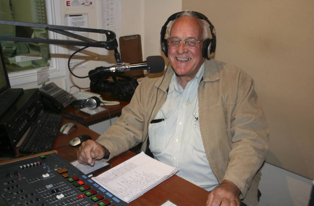 Ron Coffey mans the desk at QBN-FM (PHOTO: Ben Hope).