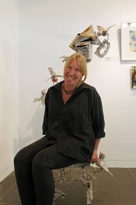 Queanbeyan artist Sonja Kalenjuk with her award-winning work 'RE-chair', currently on exhibition at The Q.