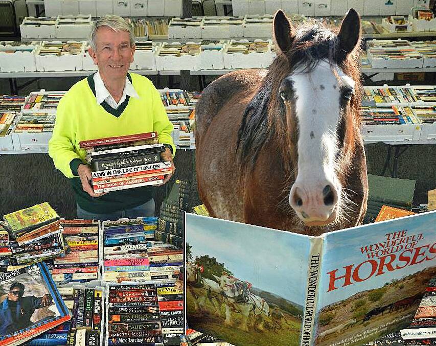 Deputy mayor Peter Bray gets into the Spring Carnival spirit ahead of next weekend's massive Charity Book Fair at the Queanbeyan Racecourse (August 22-24).