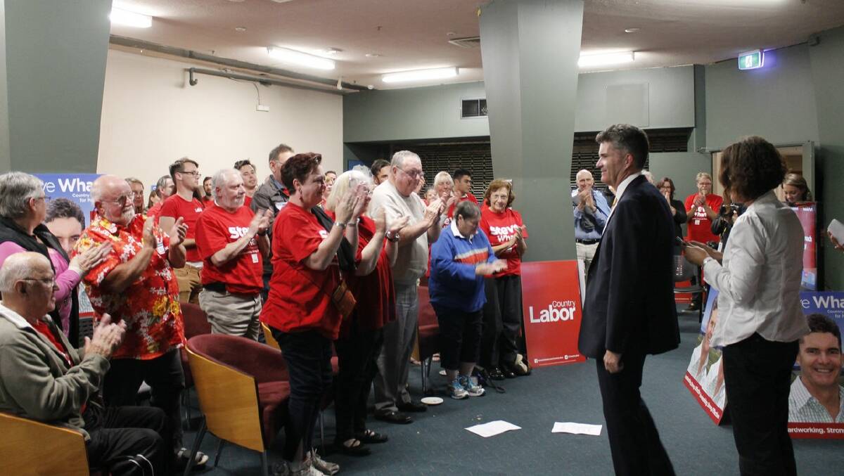 Steve Whan is applauded by Labor supporters at the Queanbeyan Leagues Club on Election Night (PHOTO: David Butler).