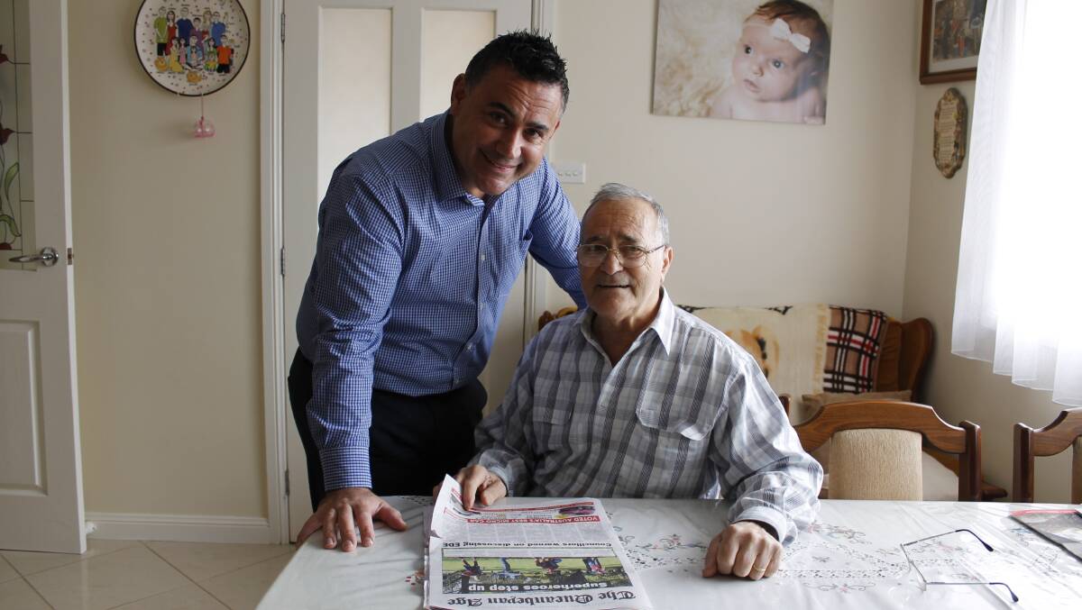 John Barilaro and his father Domenic read the Queanbeyan Age at Domenic's Queanbeyan home (Photo: David Butler).