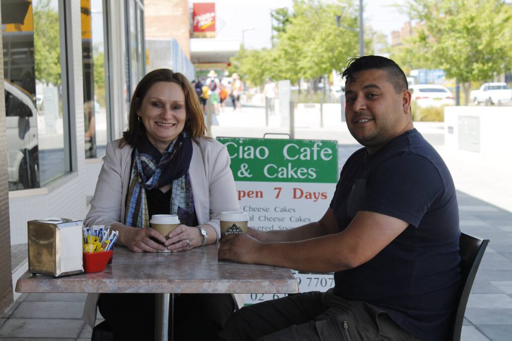 Liz Webb of Richmond PRA and local cafe owner Ab Guleria have teamed up to start a 'Suspended Coffee' initiative in Queanbeyan. Photo: Kim Pham.