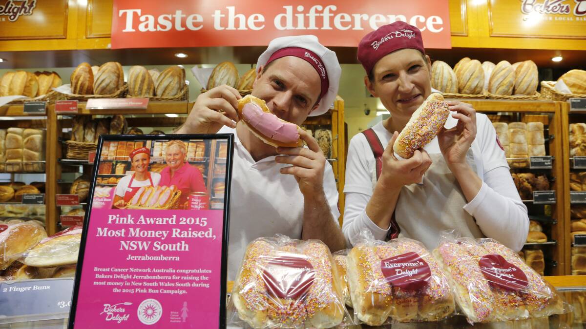 Michael Blucher and Michelle Jesshope of Bakers Delight Jerrabomberra were thrilled to be named one of the top fundraisers for the Pink Bun campaign. Photo: Kim Pham.