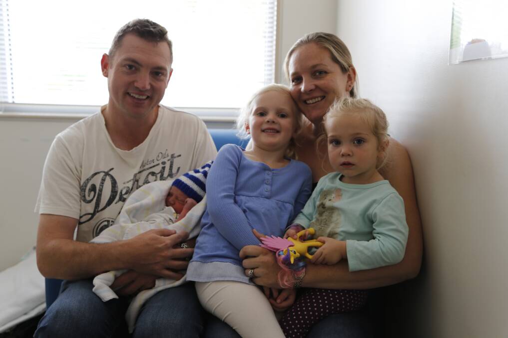 The Singers family including parents Mathew and Virginia with their children, all born at Queanbeyan hospital, Mackenzie, 4, Darcy, 2 and newest arrival, Clancy. Photo: Kim Pham.