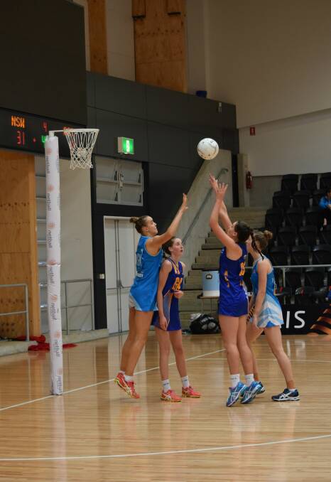 Jacoba Clough nets one of her 114 goals at the Australian under 17s Netball Championships in April.