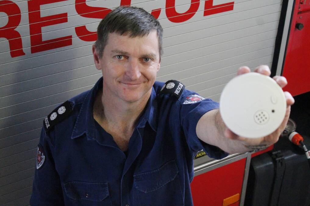 Queanbeyan Fire Station commander Cory Wilkinson says smoke alarms save lives. Photo: Kim Pham.