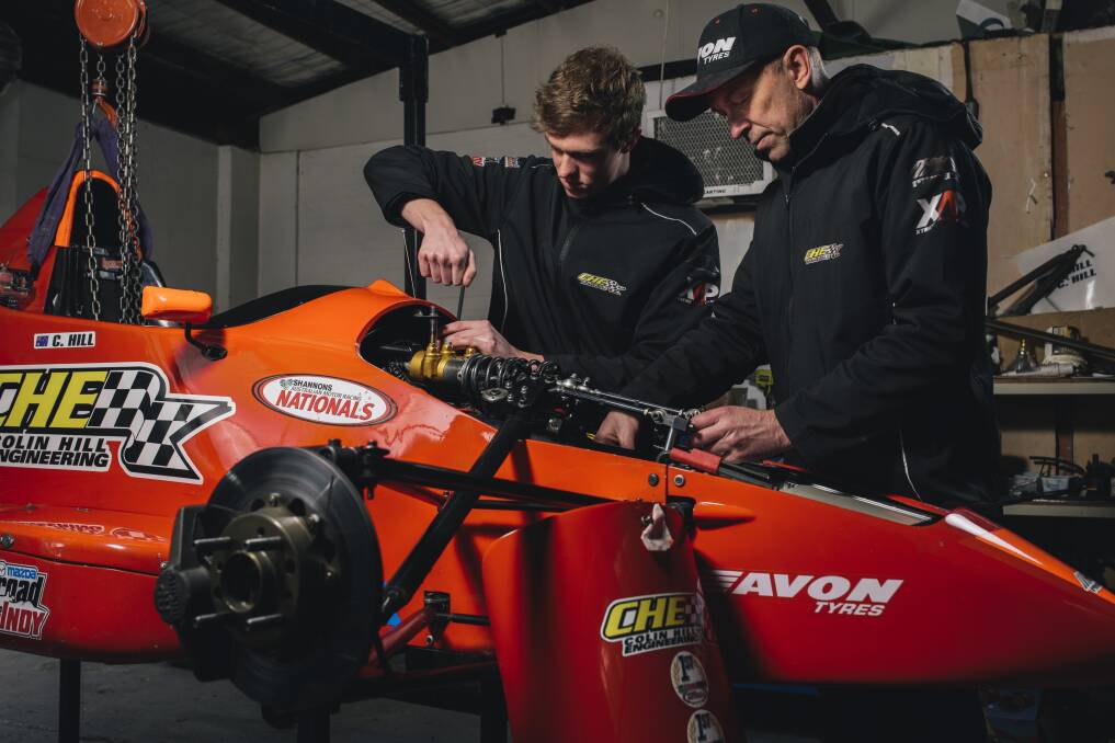 Cameron Hill and his Dad, Colin, working together on his Formula Ford Championship leading car. Photo: Rohan Thomson.