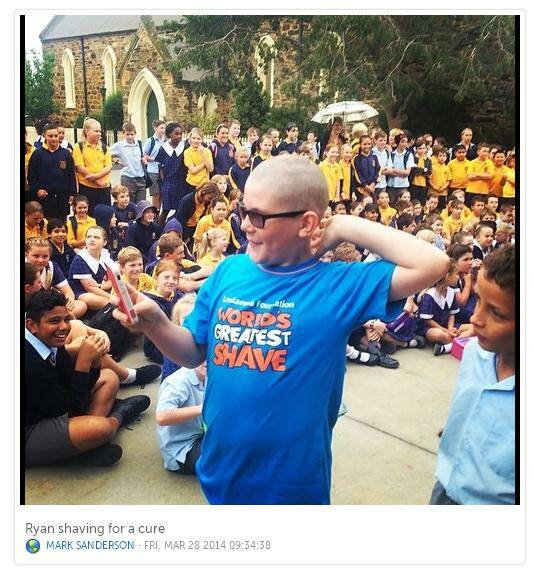 St Gregory's Primary School student Ryan admires his new look after participating in the World's Greatest Shave this week. Photo: Mark Sanderson / Instagram.