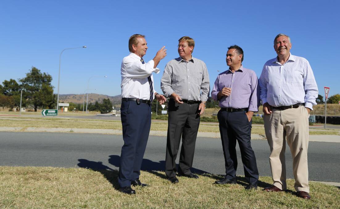 Upgrades to a major intersection in Jerrabomberra was one of the many road projects allocated funding in the NSW budget. Pictured is Queanbeyan Mayor Tim Overall, Deputy Premier Troy Grant, local Nationals' member John Barilaro and roads minister Duncan Gay at roads announcement earlier in the year. Photo: Kim Pham.