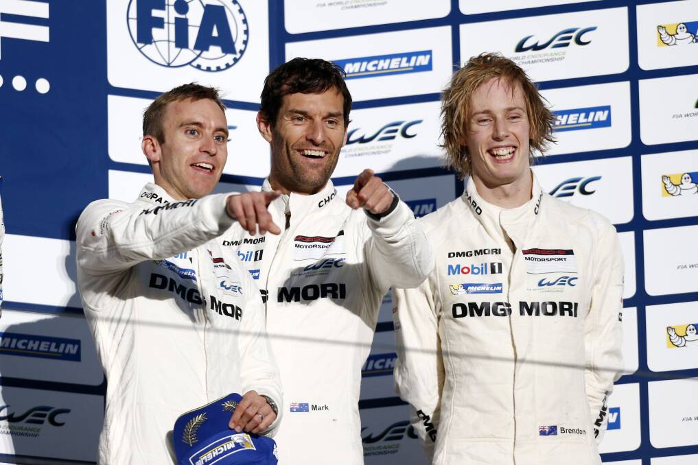 Mark Webber on last year's podium at Fuji with teammates Timo Bernhard (left) and Brendon Hartley (right). Photo: Porsche.